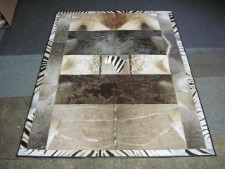 patchwork rug with leather binding